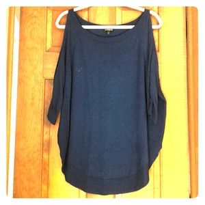Long blue sweater with shoulder cutouts